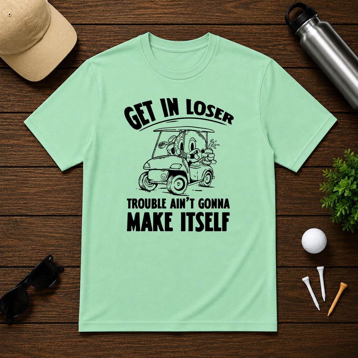Funny Golf ball character in a golf cart holding a beer saying get in loser 