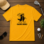 Chasing Birdies- Funny retro vintage style golf shirt of a bird carrying a golf bag full of clubs. 