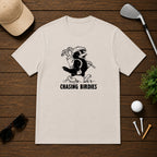 Chasing Birdies- Funny retro vintage style golf shirt of a bird carrying a golf bag full of clubs. 