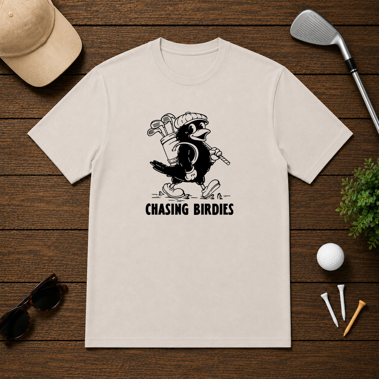 Chasing Birdies- Funny retro vintage style golf shirt of a bird carrying a golf bag full of clubs. 