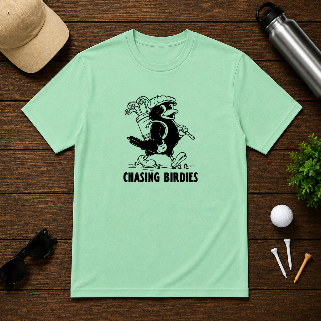 Chasing Birdies- Funny retro vintage style golf shirt of a bird carrying a golf bag full of clubs. 