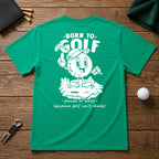 Born to golf funny retro vintage golf shirt. Golf ball character holding its hand up and pointing up and holding a golf club in the other.