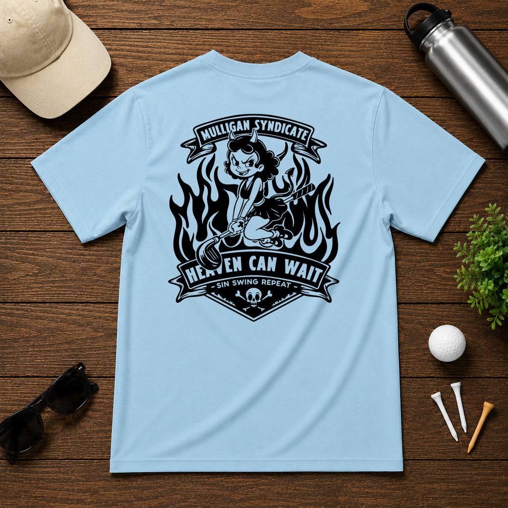 Retro style golf pinup tee shirt. Devilish girl ridding on a golf club, with flames in the background, with the saying Heaven Can Wait.