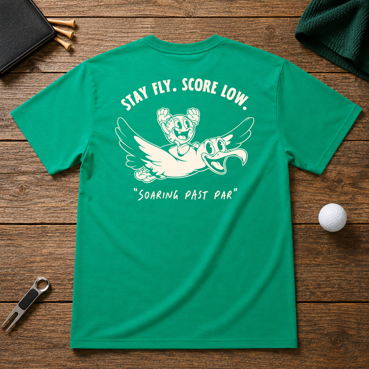 Funny golfing albatross golfer shirt. Golf Ball character riding on the back of an albatross, soaring through the air.