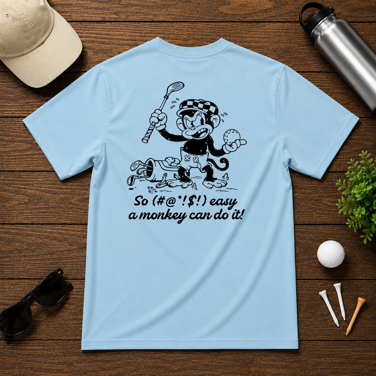 Mulligan Syndicate Retro sarcastic funny monkey golfing shirt. Monkey holding a golf ball in anger, for it not going where it was intended. 