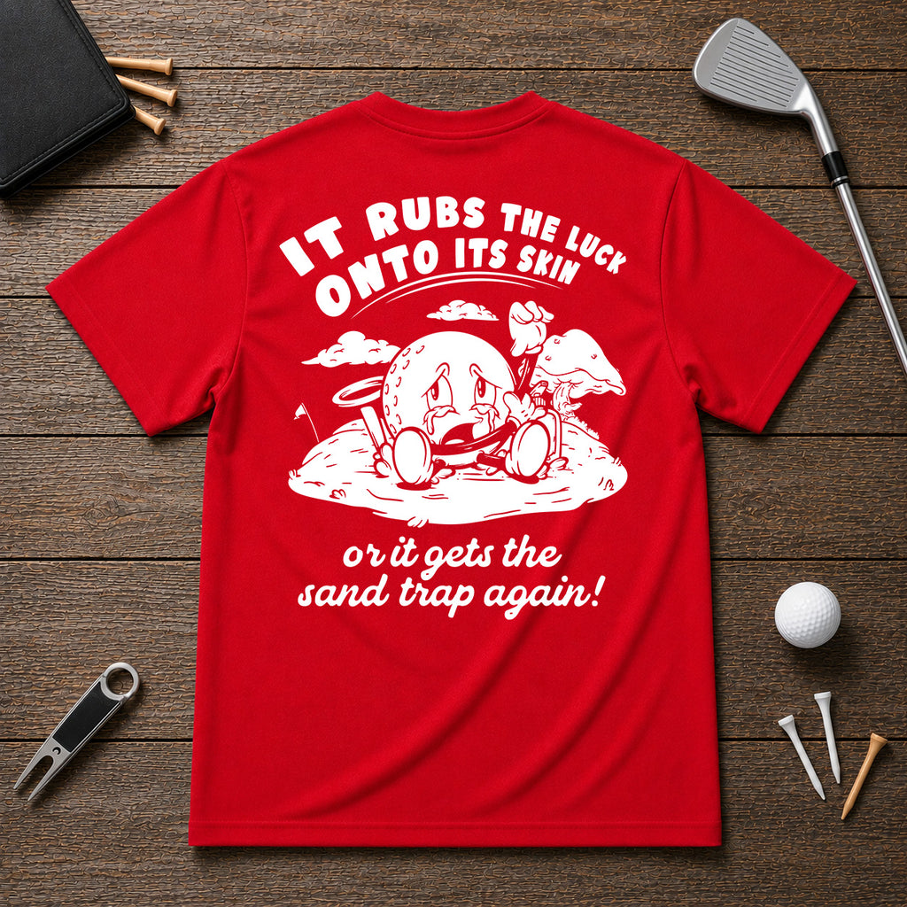 It Rubs The Luck Onto Its Skin- Funny sarcastic joke shirt for golfers that have bad luck on the golf course. Funny golf ball character rubbing luck lotion in itself, in hopes of getting to the hole.