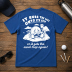 It Rubs The Luck Onto Its Skin- Funny sarcastic joke shirt for golfers that have bad luck on the golf course. Funny golf ball character rubbing luck lotion in itself, in hopes of getting to the hole.